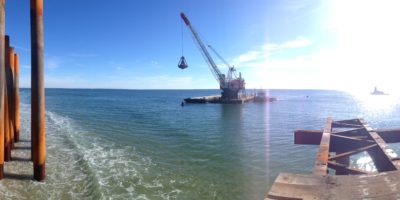 Weeks Marine Uses Its Clamshell Bucket Dredge #500 to Demolition the Casino Pier in Seaside Heights, NJ, in the Wake of Hurricane Sandy